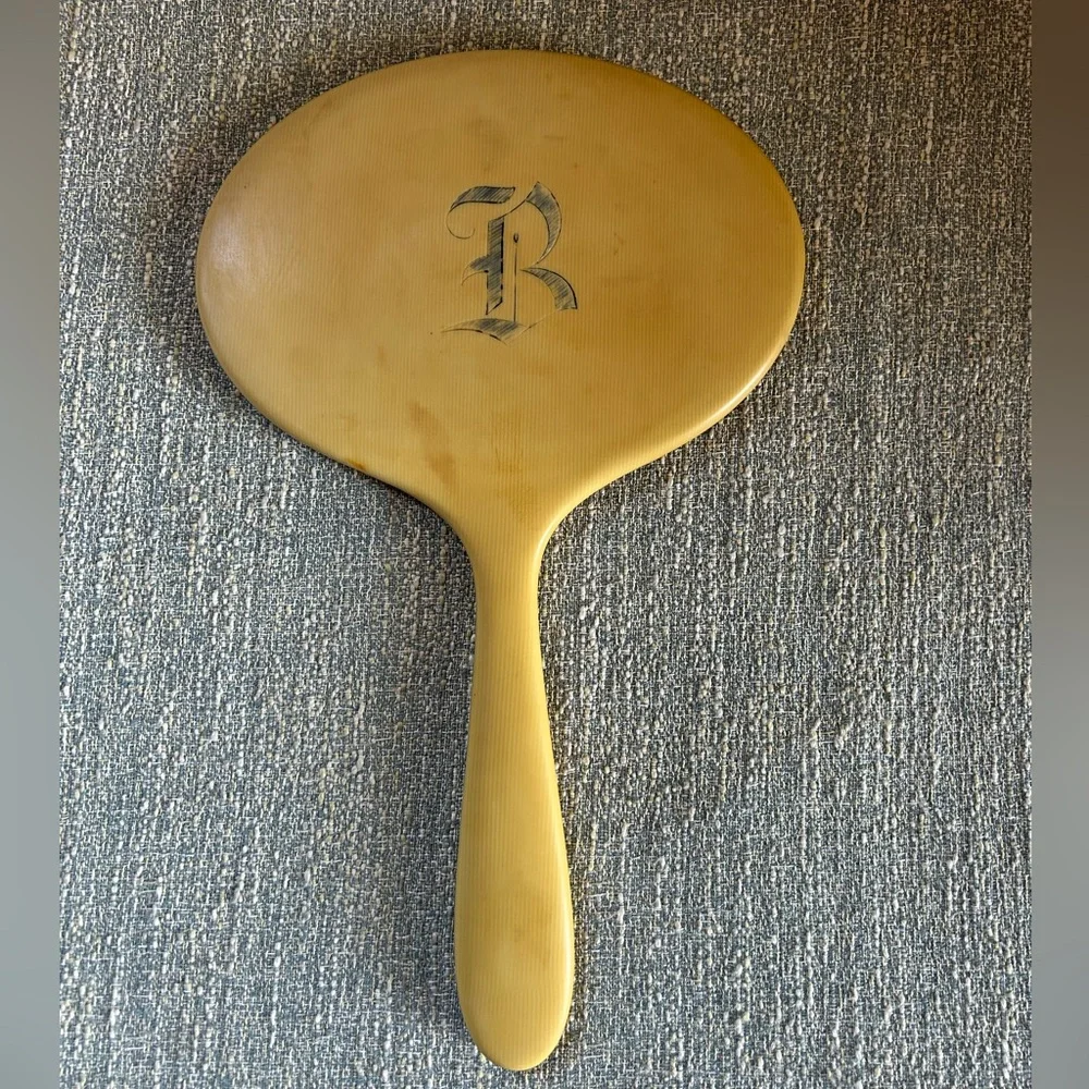 Vintage Handheld Mirror with light yellow Frame